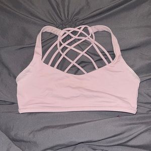 Pink Lululemon sports bra